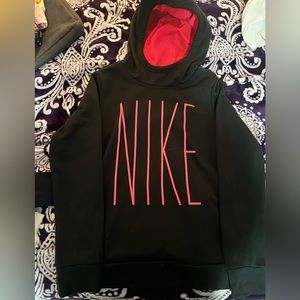 Black Nike hoodie with pink lettering on it